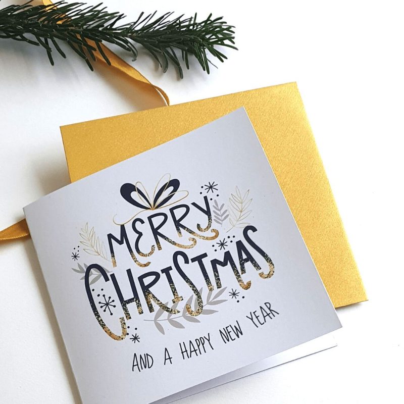 Kerstkaart voor bedrijf met gouden enveloppe